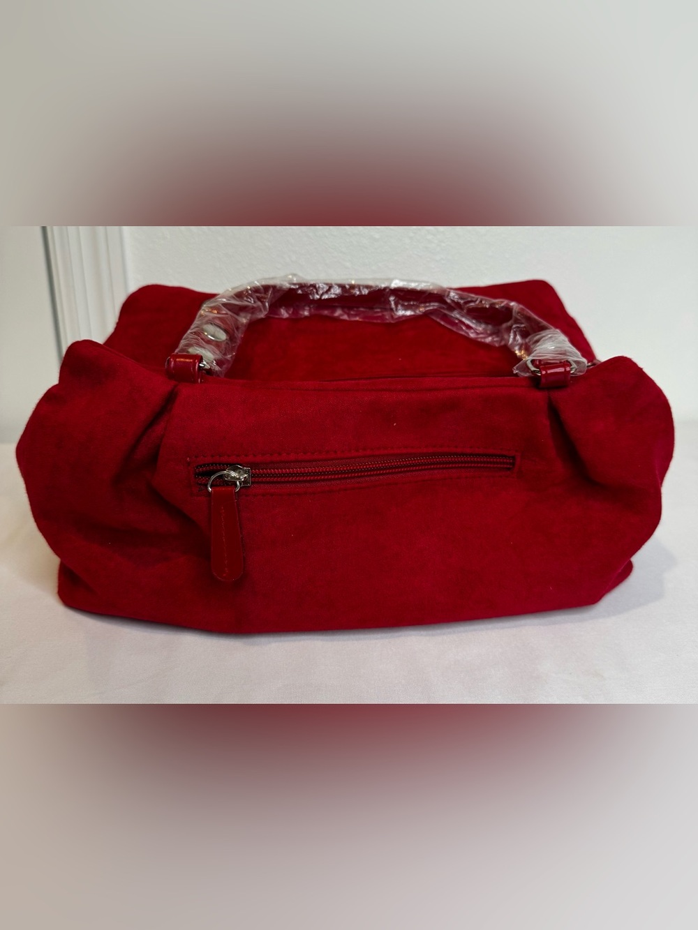 Clarin’s Rich Red Suede-like Cosmetic Bag